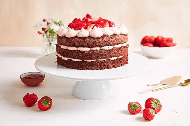 delicious sweet cake with strawberries baiser plate 1